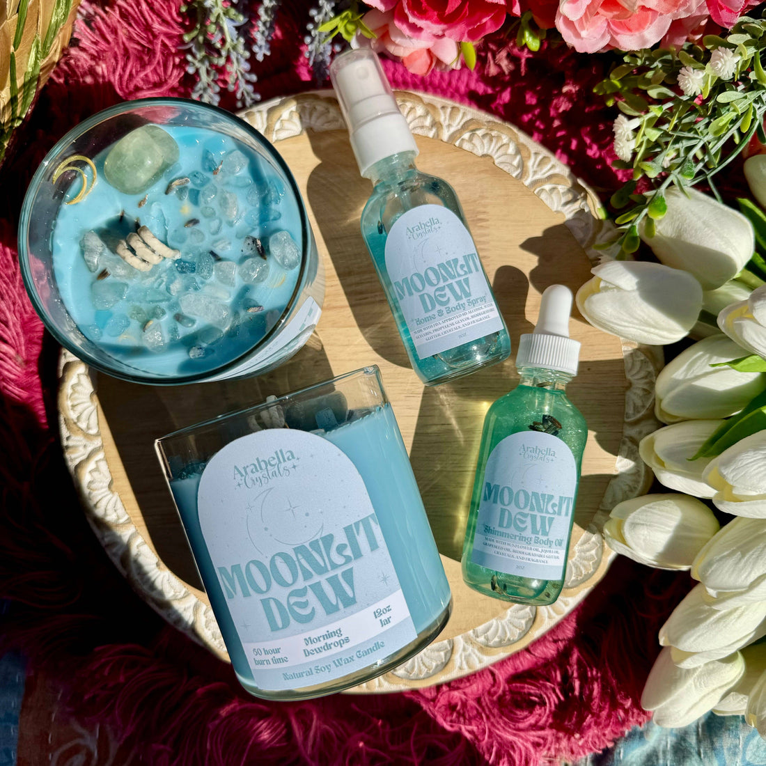 Moonstone wash, soap, candle, and holders from the Moonlit Dew Spring Collection for home and body care.