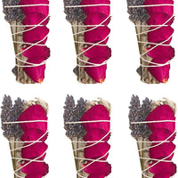 Six vibrant red roses, elegantly wrapped in twine, alongside sprigs of White Rose sage.